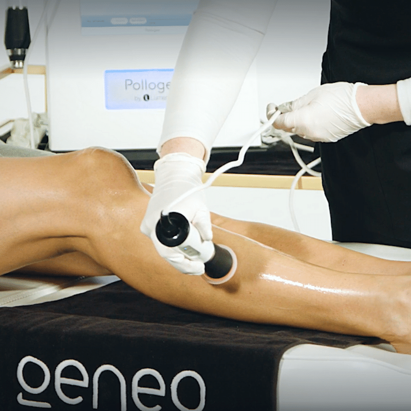 Close-up of Geneo facial treatment being performed on a woman's leg